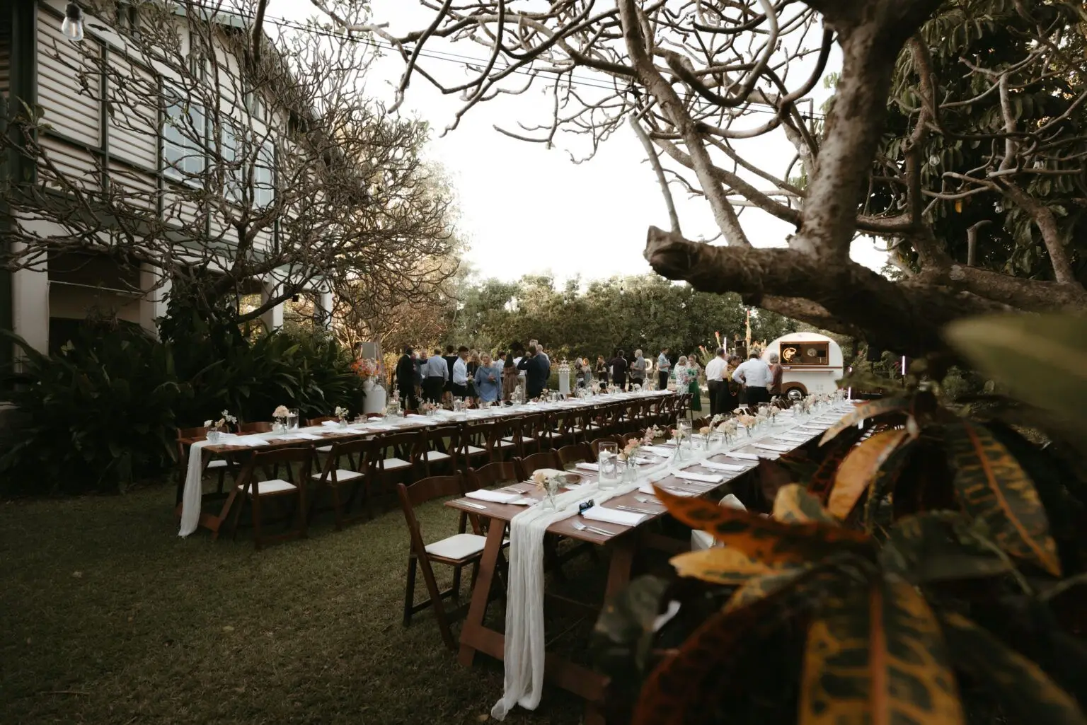 Outdoor banquet tables set up.