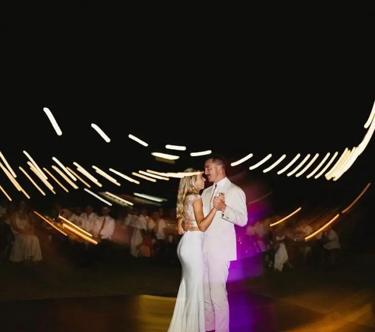 Couple dancing under lights
