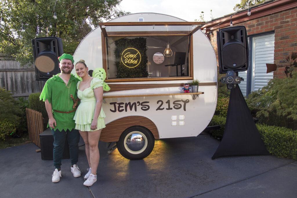 Couple with themed caravan