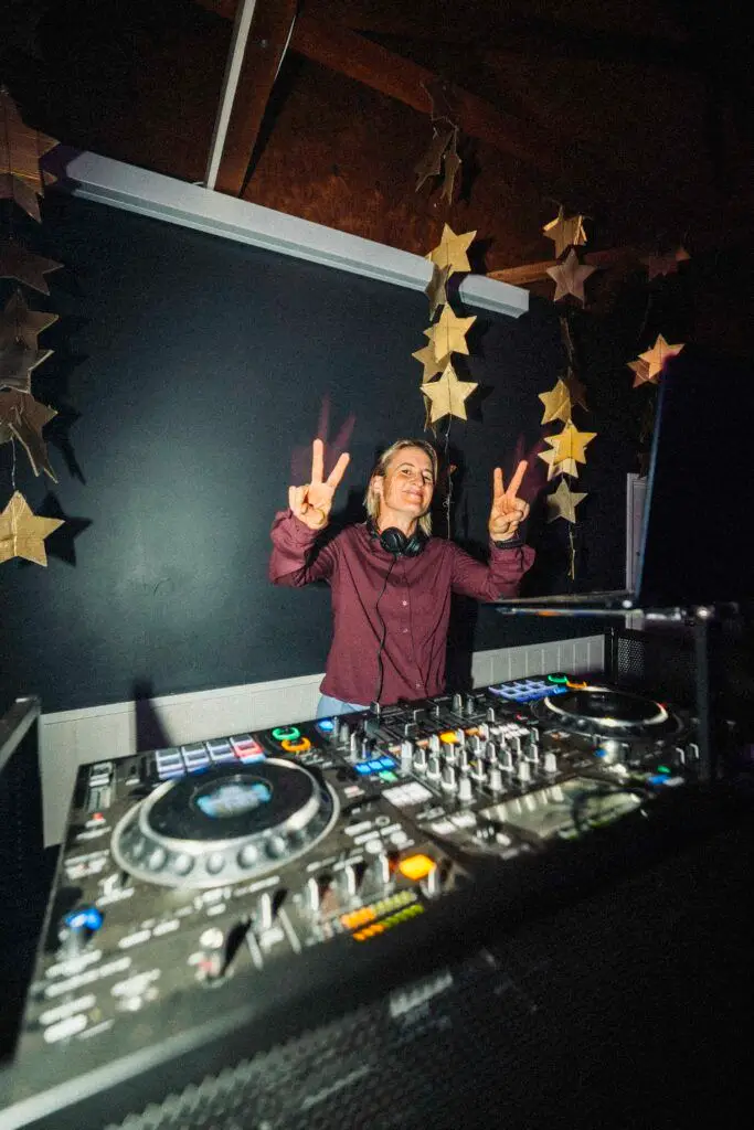 DJ posing with peace signs