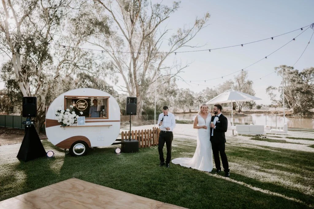 Wedding ceremony with vintage caravan